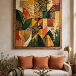 Living room wall with a large framed Ethiopian artwork above a linen sofa